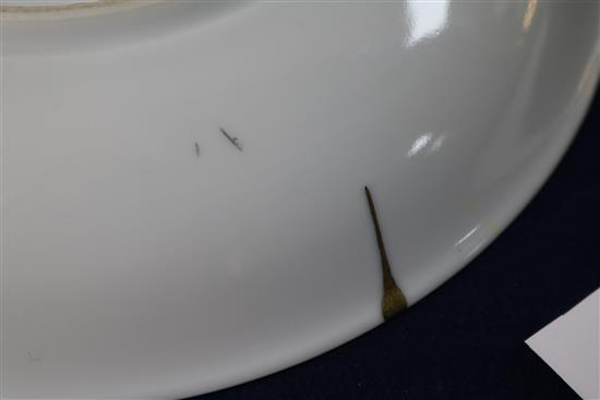 A Chinese yellow glazed dish, Jiaqing mark, gilt repair